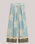 Load image into Gallery viewer, Lined trousers with beach print