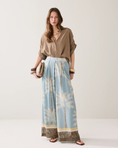 Load image into Gallery viewer, Lined trousers with beach print