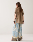 Load image into Gallery viewer, Lined trousers with beach print