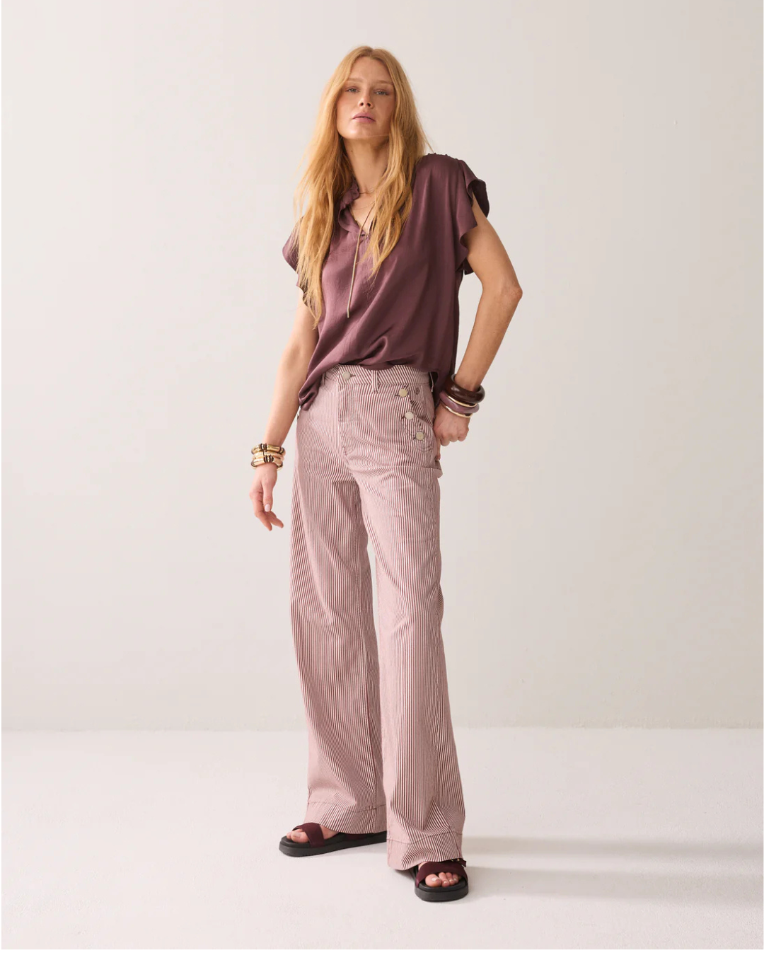 Striped flared trousers